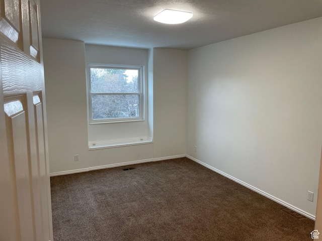 567 S Hazel Dr, Salem, UT 84653 - spare room with dark colored carpet and baseboards