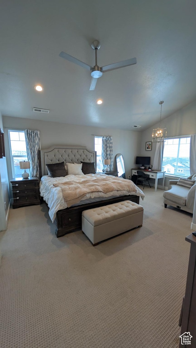 bedroom with recessed lighting, multiple windows, carpet, and ceiling fan with notable chandelier