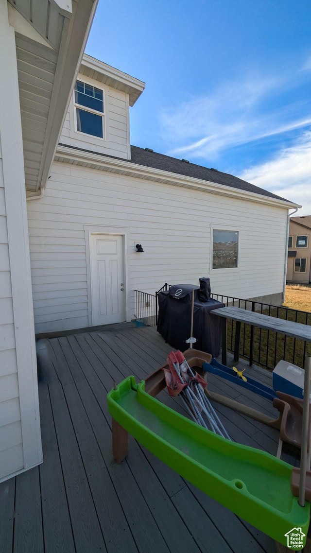 wooden terrace with grilling area
