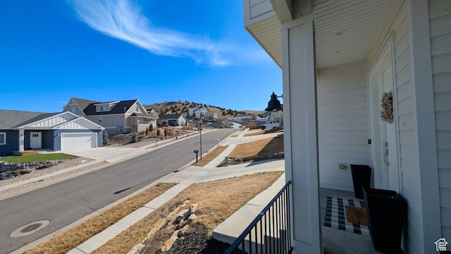 exterior space featuring a residential view and sidewalks