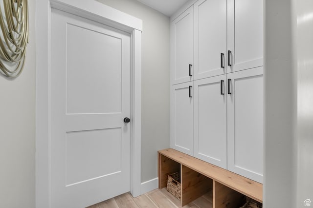mudroom featuring light wood-style floors