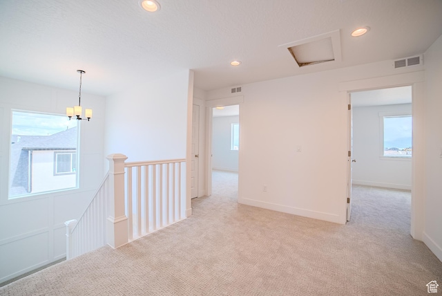 1258 S Boxelder Dr, Saratoga Springs, UT 84005 - corridor with an upstairs landing, light carpet, recessed lighting, and a chandelier