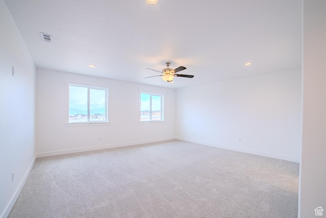 1258 S Boxelder Dr, Saratoga Springs, UT 84005 - empty room featuring light carpet, baseboards, recessed lighting, and ceiling fan