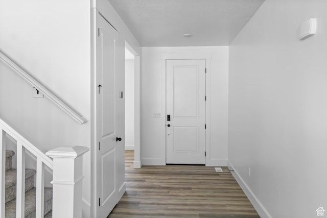 2391 W 2950 N Unit 102, Farr West, UT 84404 - corridor with baseboards and wood finished floors