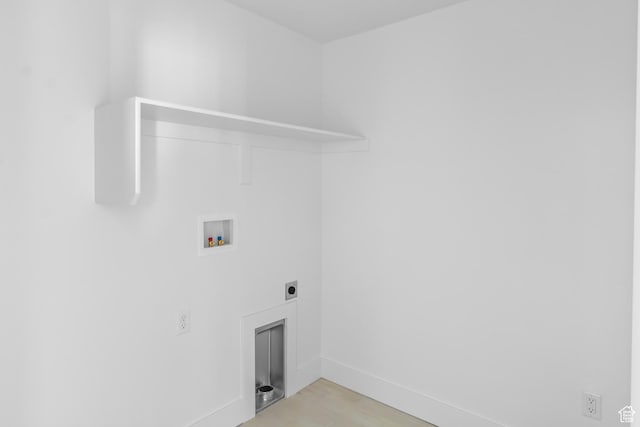 2391 W 2950 N Unit 102, Farr West, UT 84404 - washroom featuring light wood finished floors, washer hookup, baseboards, laundry area, and electric dryer hookup