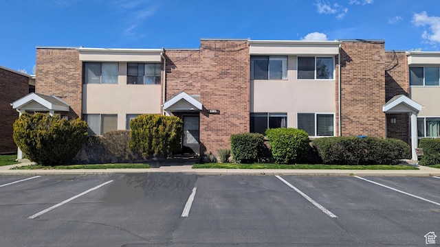 825 E 3990 S Unit C, Millcreek, UT 84107 - view of building exterior with uncovered parking
