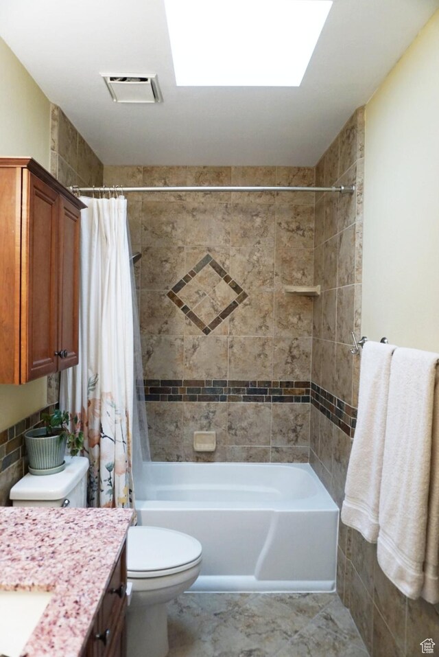 825 E 3990 S Unit C, Millcreek, UT 84107 - bathroom with shower / bath combo, visible vents, vanity, and toilet