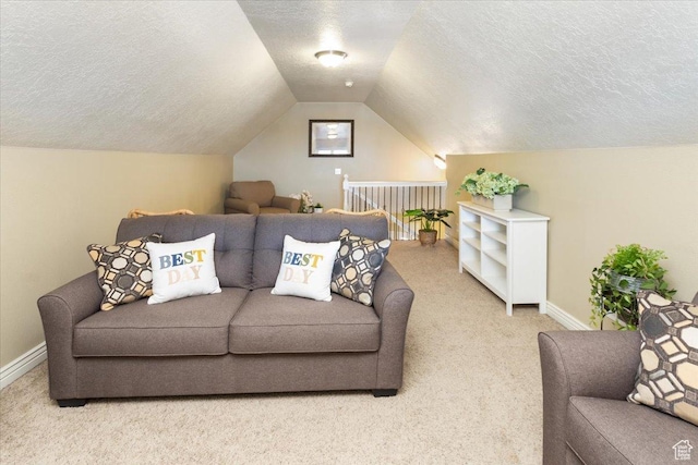 carpeted living area featuring baseboards, vaulted ceiling, and a textured ceiling