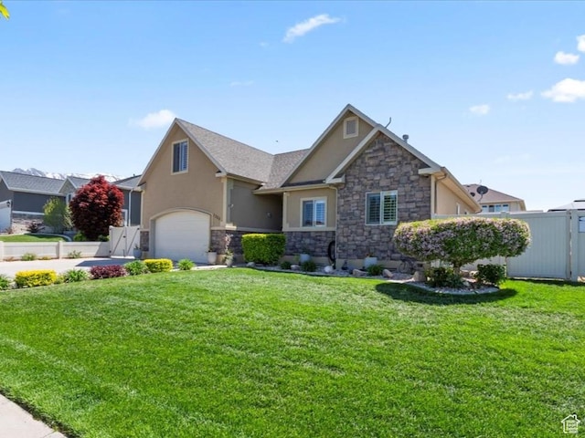 1325 W Trailside Dr, Santaquin, UT 84655 - view of front of property featuring stone siding, stucco siding, and a garage