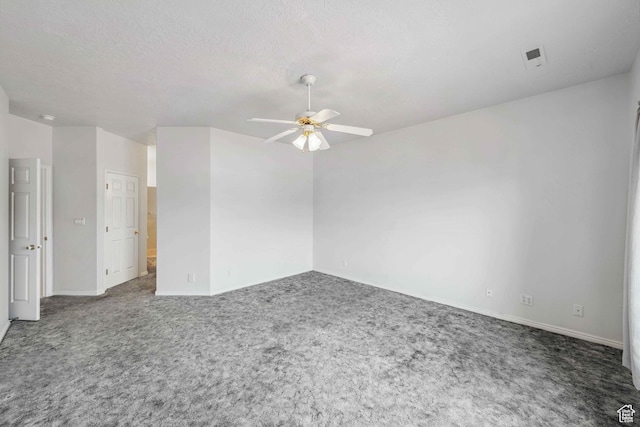 3546 Windmill Dr, Santa Clara, UT 84765 - carpeted spare room with baseboards, ceiling fan, and a textured ceiling