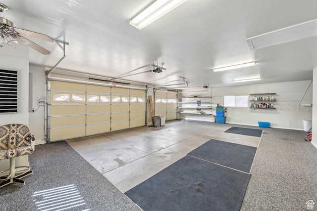 3546 Windmill Dr, Santa Clara, UT 84765 - garage featuring a garage door opener and ceiling fan