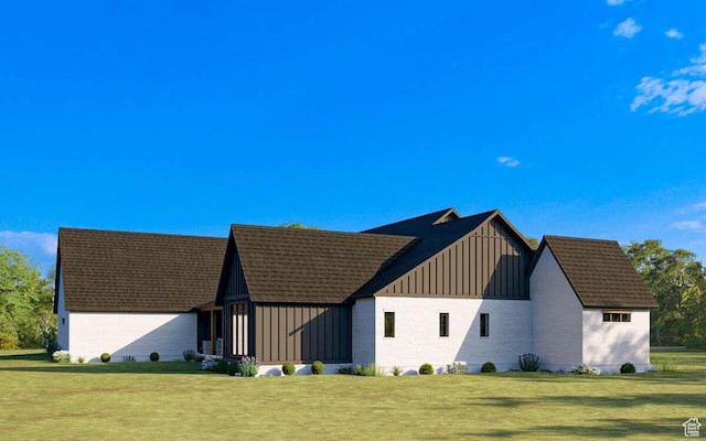view of home's exterior with board and batten siding and a yard