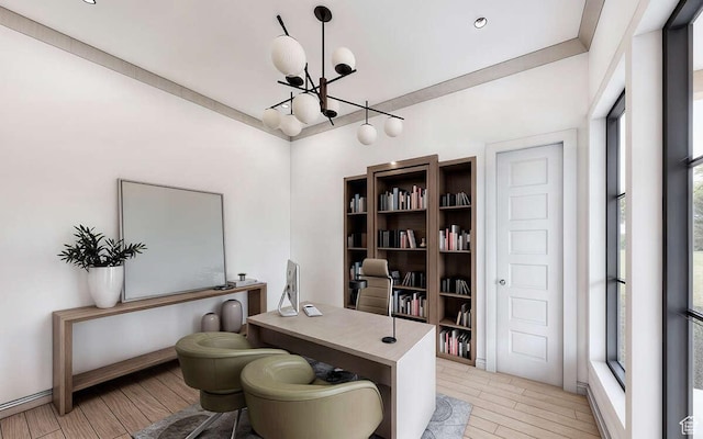 office area with a healthy amount of sunlight, a notable chandelier, and light wood finished floors