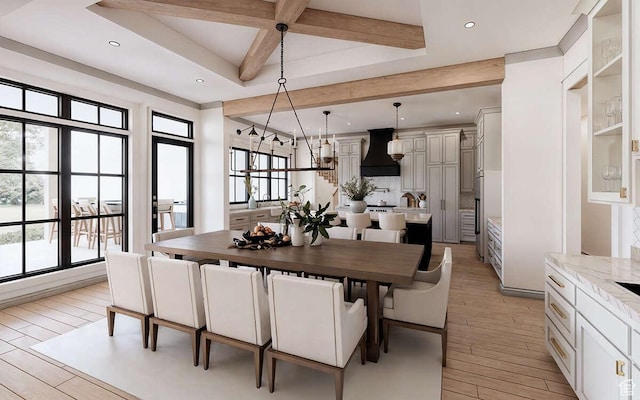 dining space with recessed lighting, coffered ceiling, light wood-type flooring, and beam ceiling