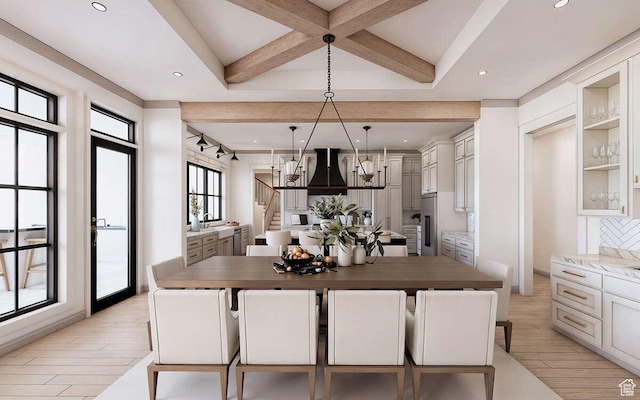 kitchen with coffered ceiling, premium range hood, high end refrigerator, beamed ceiling, and light wood finished floors
