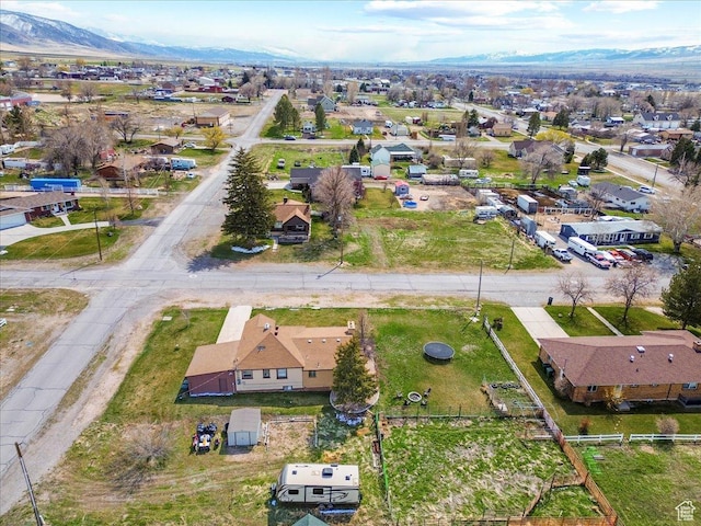 aerial view featuring a mountain view and a residential view