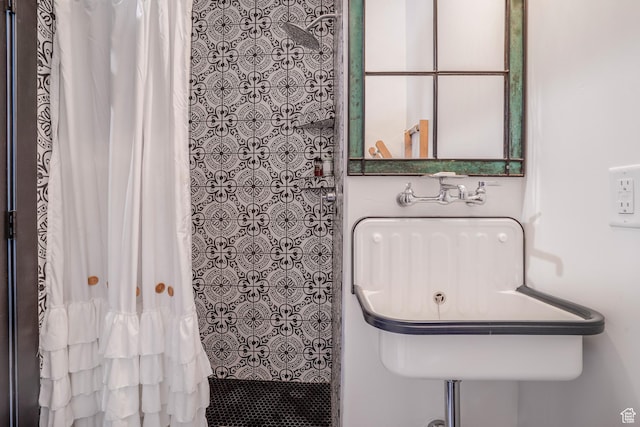 bathroom with a shower with curtain
