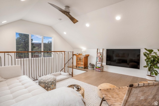 living room featuring ceiling fan, recessed lighting, wood finished floors, and lofted ceiling
