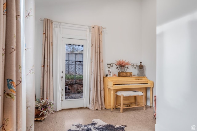doorway to outside with speckled floor