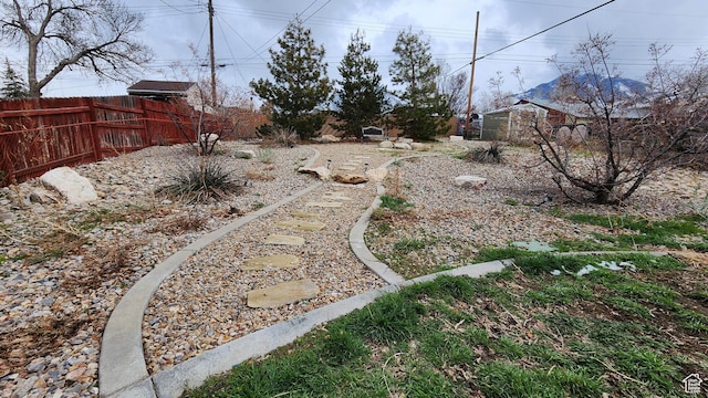 view of yard with fence