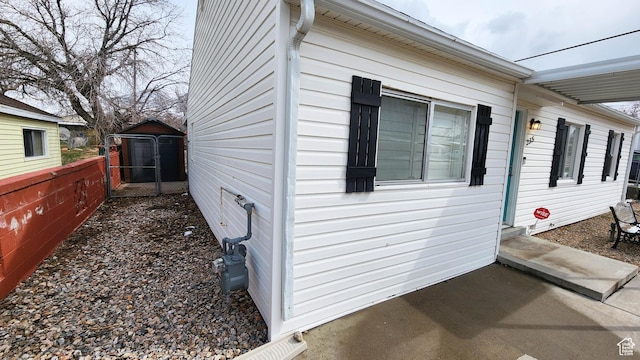 view of property exterior featuring fence