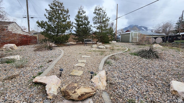 view of yard with fence