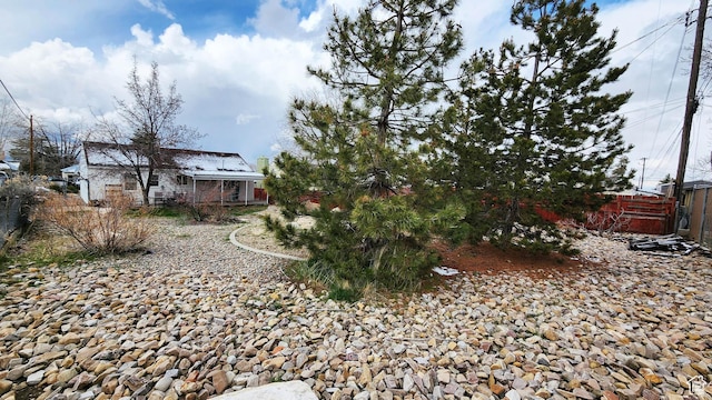 view of yard featuring fence