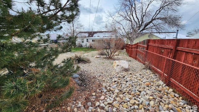 view of yard featuring fence