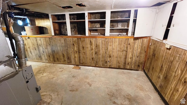 unfinished below grade area with wooden walls