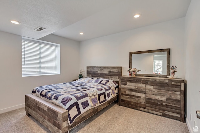 4103 S Sunrise Dr, Saratoga Springs, UT 84045 - carpeted bedroom featuring recessed lighting, a textured ceiling, baseboards, and visible vents