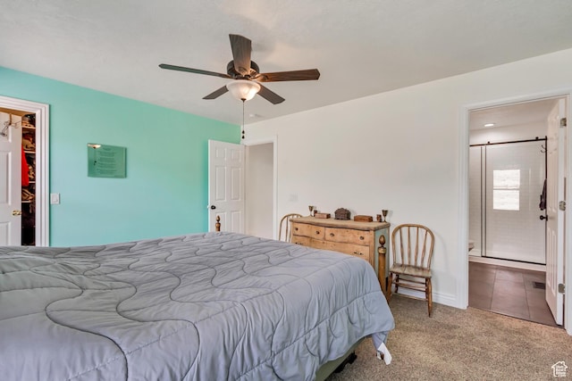 4103 S Sunrise Dr, Saratoga Springs, UT 84045 - bedroom with carpet flooring, tile patterned flooring, a walk in closet, and a ceiling fan