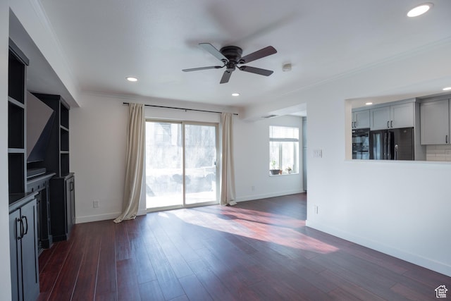 440 E Creekside Cir S Unit B, Murray, UT 84107 - unfurnished living room with baseboards, ornamental molding, a ceiling fan, and dark wood finished floors