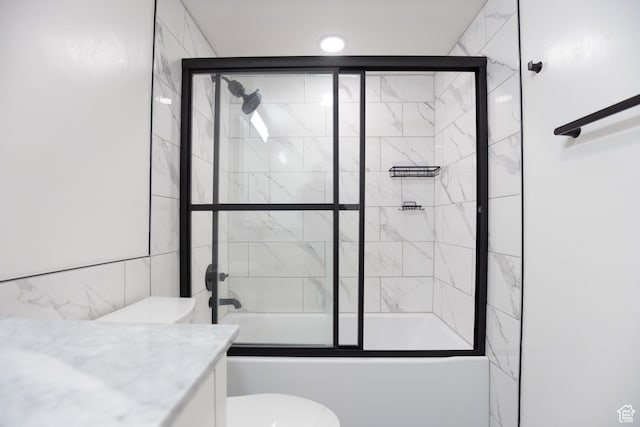 440 E Creekside Cir S Unit B, Murray, UT 84107 - full bathroom featuring bath / shower combo with glass door, toilet, and vanity