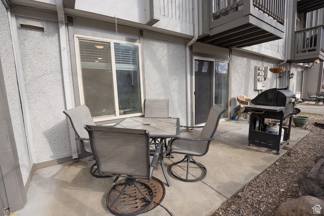 440 E Creekside Cir S Unit B, Murray, UT 84107 - view of patio / terrace featuring grilling area, a balcony, and outdoor dining space
