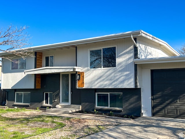 6770 W 3860 S, West Valley City, UT 84128 - view of front of property with an attached garage