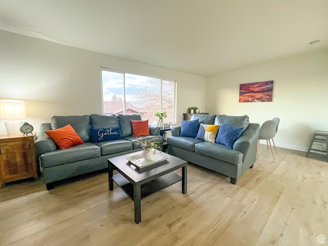 6770 W 3860 S, West Valley City, UT 84128 - living room with baseboards and light wood finished floors