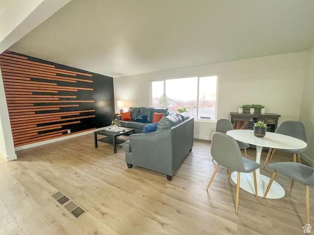 6770 W 3860 S, West Valley City, UT 84128 - living room with light wood-style flooring, baseboards, and visible vents