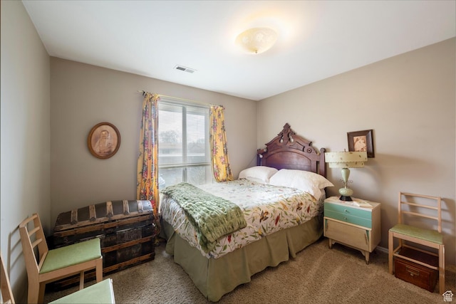 bedroom featuring carpet floors and visible vents