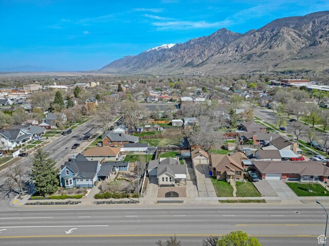 aerial view with a mountain view and a residential view