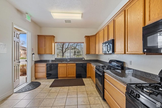 1234 S 1150 W, Payson, UT 84651 - kitchen featuring black appliances, a sink, light tile patterned flooring, brown cabinets, and a textured ceiling