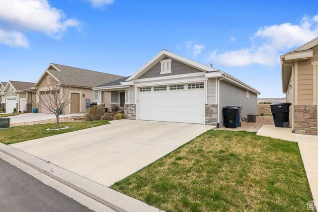 1234 S 1150 W, Payson, UT 84651 - view of front of property with stone siding, an attached garage, driveway, and a front yard