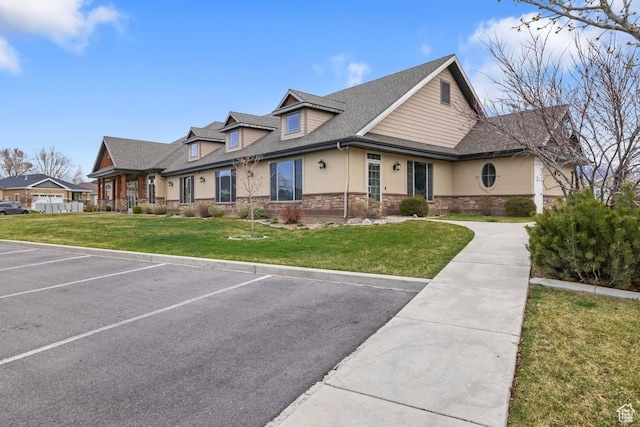 1234 S 1150 W, Payson, UT 84651 - view of front of house with stone siding, uncovered parking, a front yard, and stucco siding
