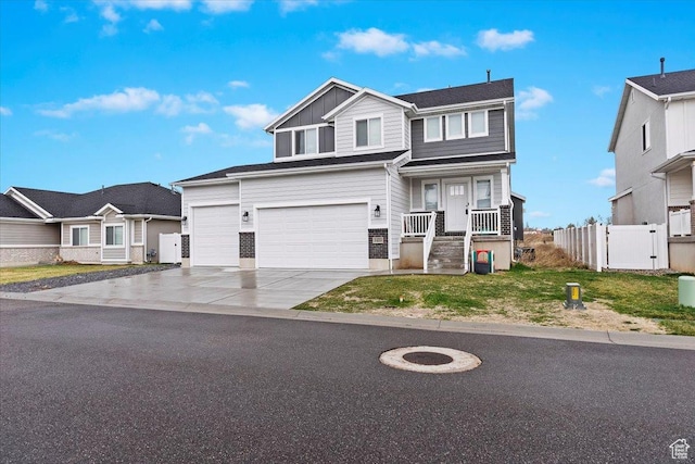 2459 W Glover Ln S, West Haven, UT 84401 - traditional-style home featuring covered porch, a front yard, fence, an attached garage, and concrete driveway
