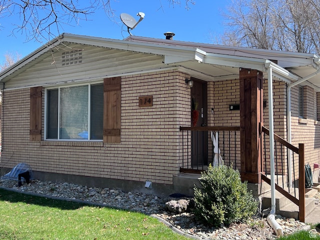 174 N 500 E, Logan, UT 84321 - view of front of home featuring brick siding