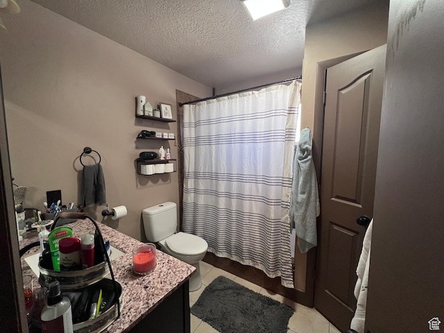 174 N 500 E, Logan, UT 84321 - full bath featuring a textured ceiling, vanity, tile patterned flooring, toilet, and a shower with shower curtain
