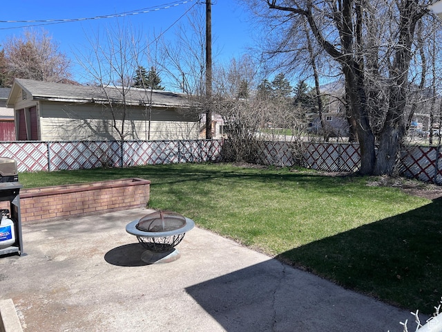 174 N 500 E, Logan, UT 84321 - view of yard with a patio area, a fire pit, and fence