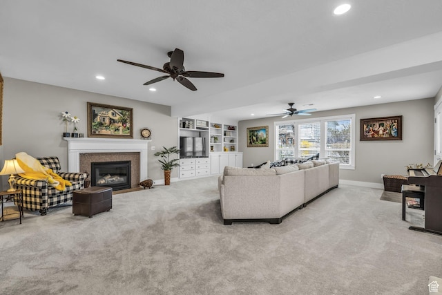 945 E Diana Way, Sandy, UT 84094 - carpeted living room featuring ceiling fan, recessed lighting, a fireplace with flush hearth, and baseboards