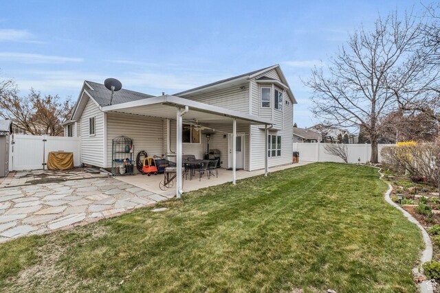 945 E Diana Way, Sandy, UT 84094 - back of house with a patio, a fenced backyard, a gate, and a lawn