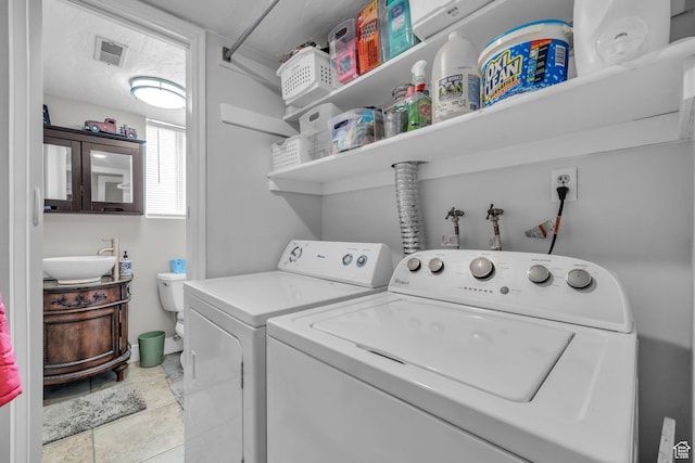 945 E Diana Way, Sandy, UT 84094 - laundry area featuring a sink, visible vents, washing machine and clothes dryer, and laundry area