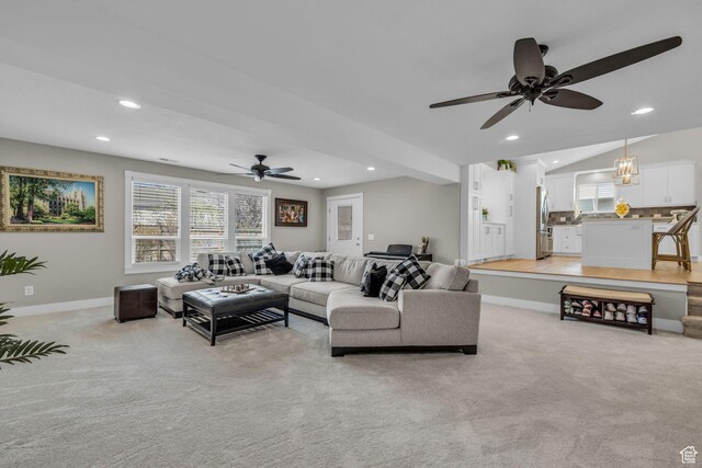 945 E Diana Way, Sandy, UT 84094 - living area featuring light colored carpet, a ceiling fan, and recessed lighting